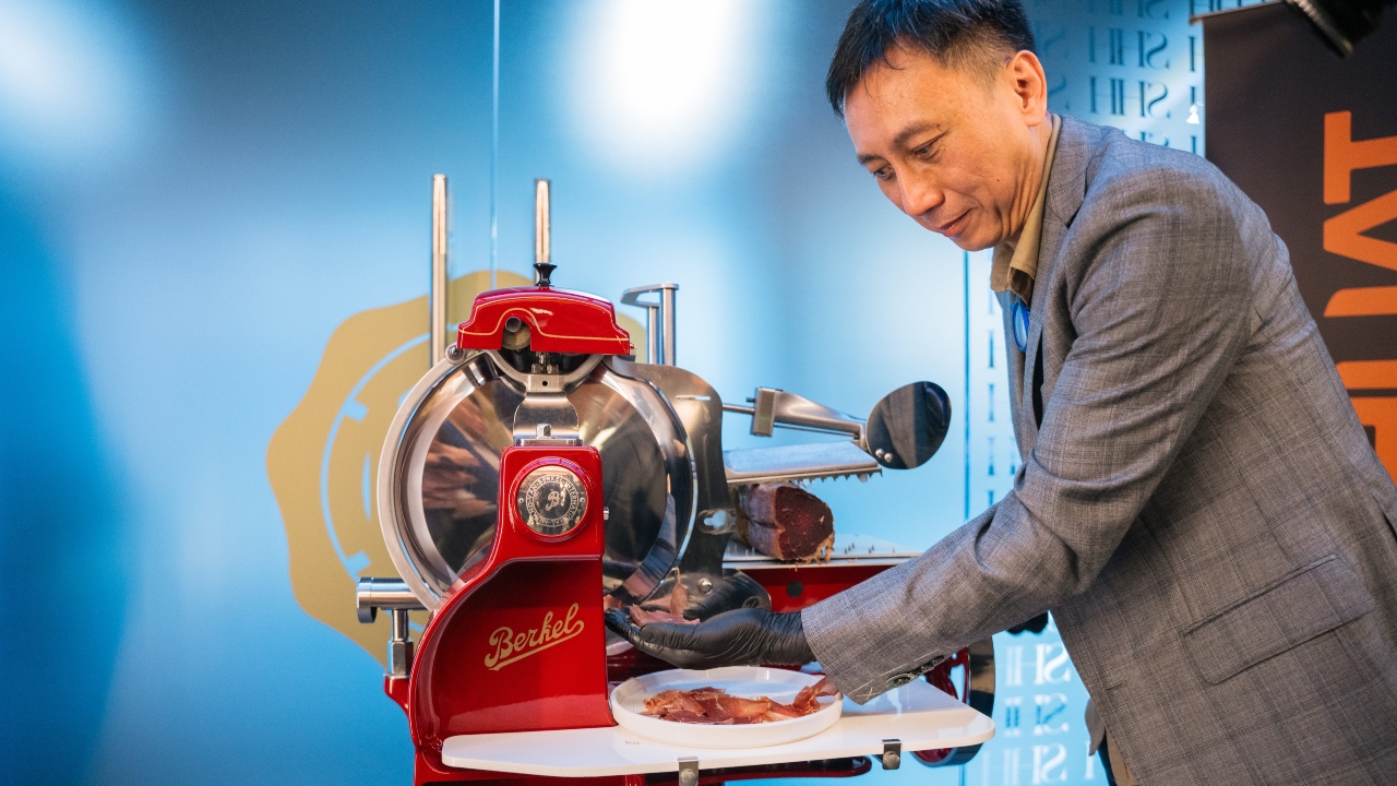 Ken Lai of Unusual Marketplace slices the Spanish Cecina for cocktail hour.