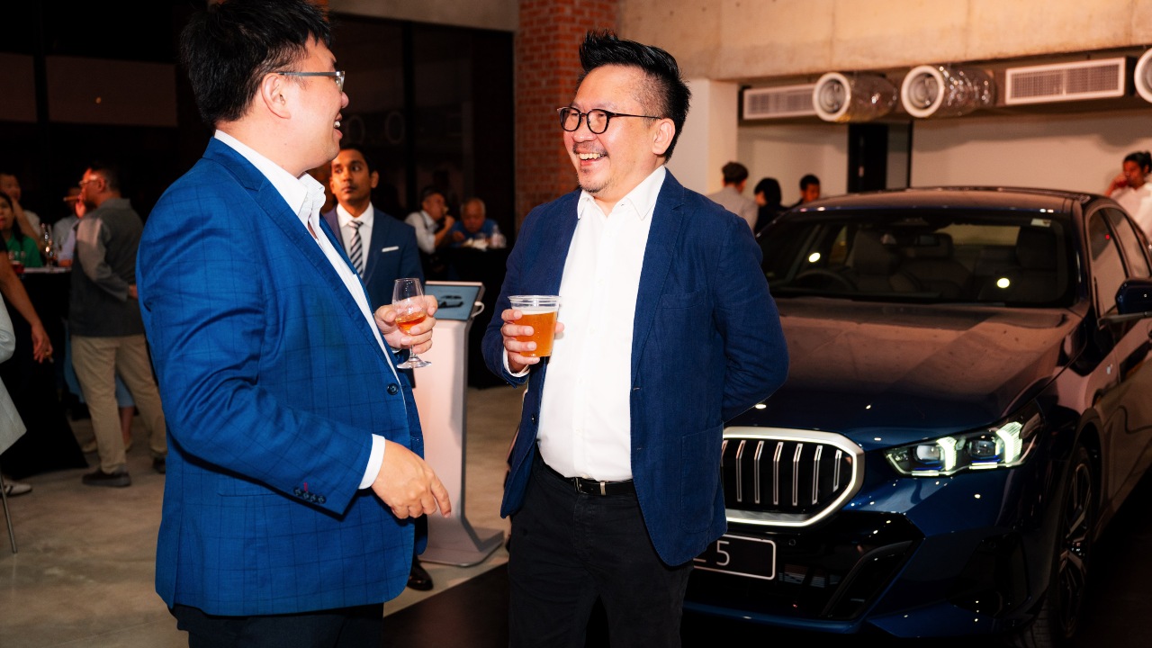 Alex Tang, dealer principal of Quill Automobiles (right), shares a light moment with Robb Report Malaysia’s Kenneth Tan.