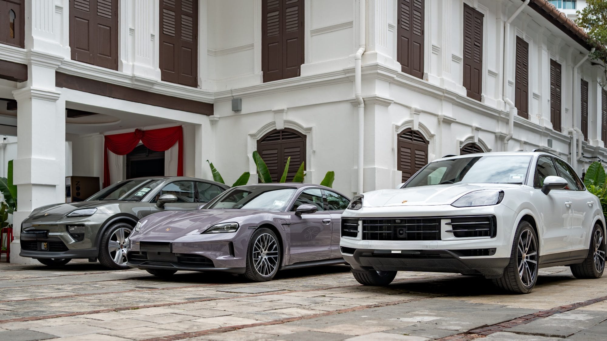 From left: the Macan 4 Electric, the Taycan, and the Cayenne V6. The first two have the ability to charge from 10 to 80 per cent in 18 minutes, while the latter delivers 348 horsepower.