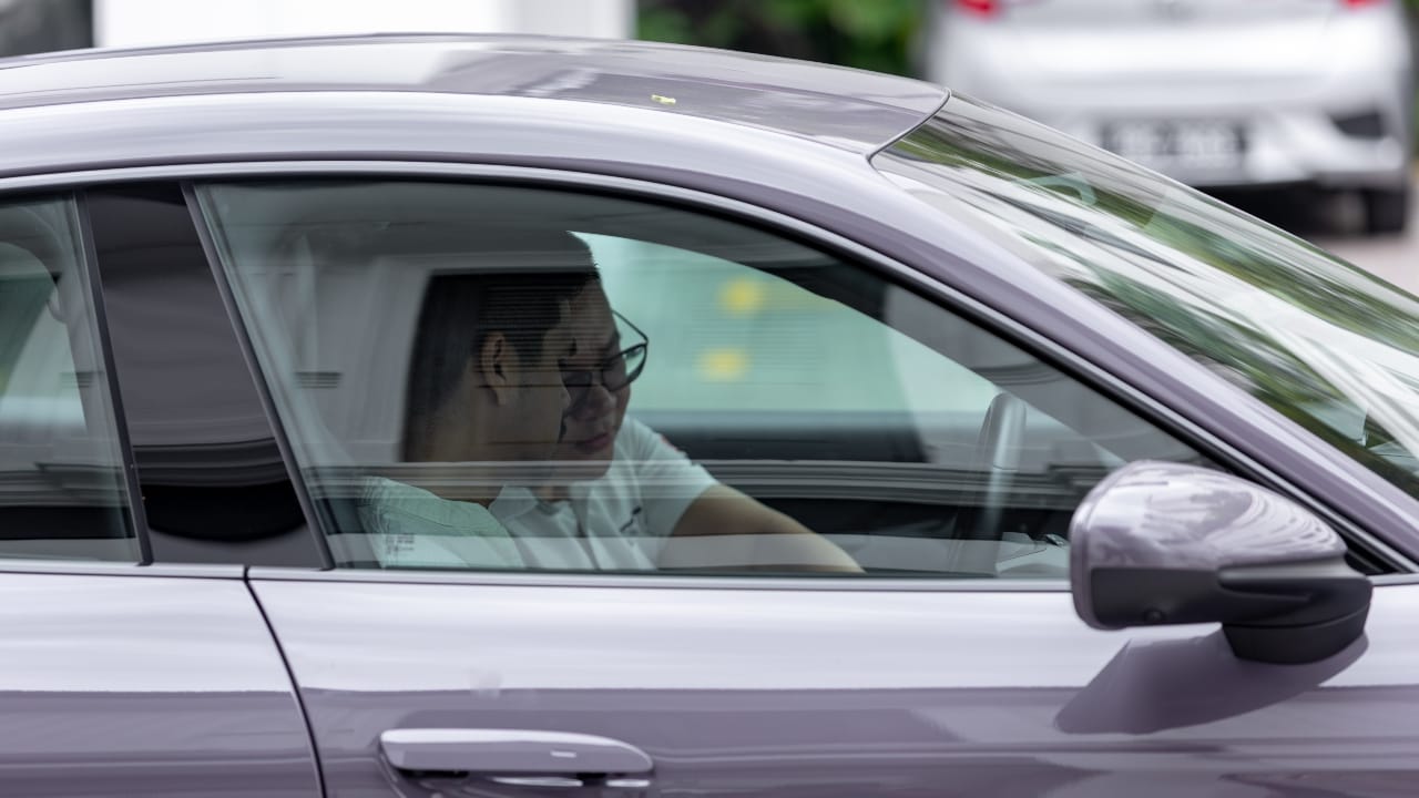 Guests experiencing the Porsche models.